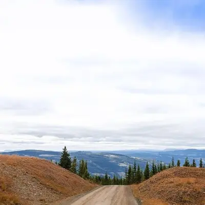 a dirt road on the side of a hill at Cozy apartment in Hafjell - Øyer centre in Hafjell