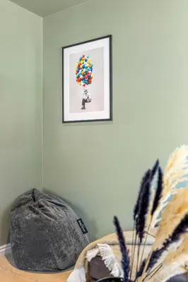 a room with a picture of a tree with balloons on the wall at Trolltunga View in Tysso