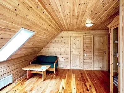 a wooden room with a bench and a table in it at 6 person holiday home in Gudvangen-By Traum in Gudvangen