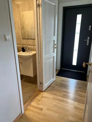 a bathroom with a sink and a mirror at Apartment in Åsane in Bergen