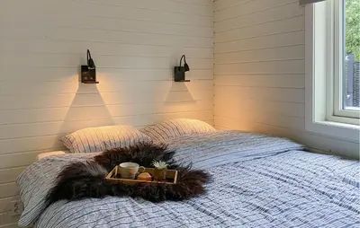 a bedroom with a bed with a tray on it at Gorgeous Home In Skjold With Kitchen in Skjold