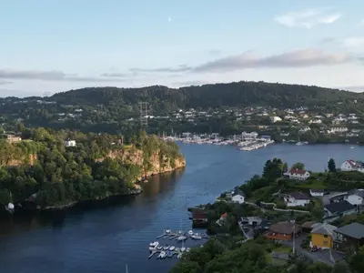 an aerial view of a river with boats docked at Apartments Bergen with sea view! in Bergen