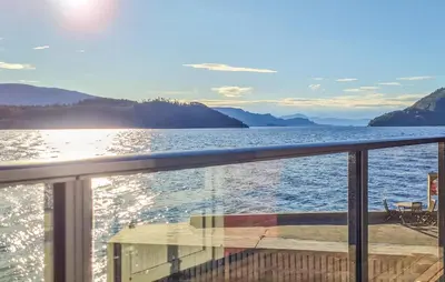 a view of the water from the deck of a boat at 3 Bedroom Nice Home In Os in Oma