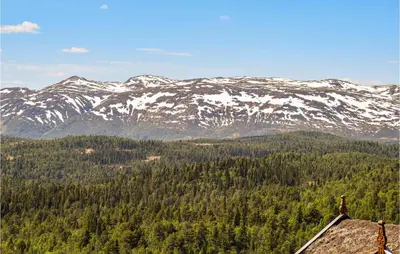 a view of a mountain range with snow covered mountains at Awesome Apartment In Rauland With Sauna in Rauland