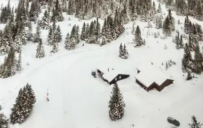 an aerial view of a ski lodge in the snow at 3 Bedroom Amazing Home In Lillehammer in Lillehammer