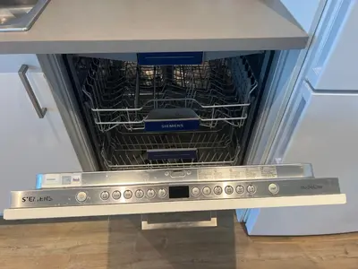 an oven with a dish rack in it at Fin leilighet med parkering! in Bergen