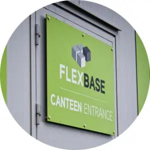 a green sign that reads flex base carificial entrance at Flexbase in Brekstad