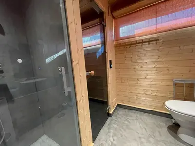 a bathroom with a shower and a toilet at Veslestølen - Ålhytte with amazing view, 1000 meter in Ål