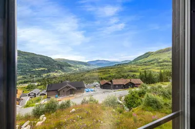 a view of a valley from a window at Hodlekvevegen 307 in Sogndal