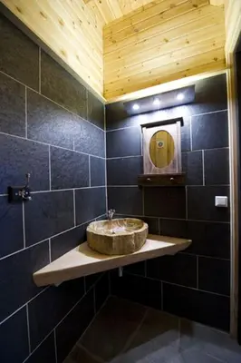 a bathroom with a sink and a mirror at Grindastugu cabin right by Liatoppen Ski Centre. in Ål