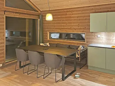 a dining room with a table and chairs at 6 person holiday home in Sollia-By Traum in Brenn