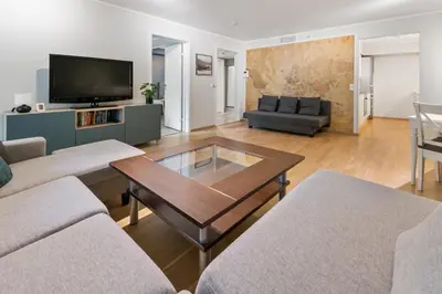 a living room with a couch and a coffee table at Modern and central apartment in Bergen in Bergen
