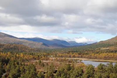 a view of a lake in the mountains at Lusæter Timber Cabins in Heidal
