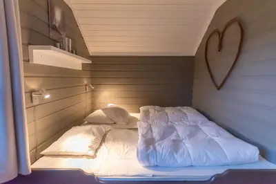 a small room with a bed in it at Trysil Alpin 40A in Trysil