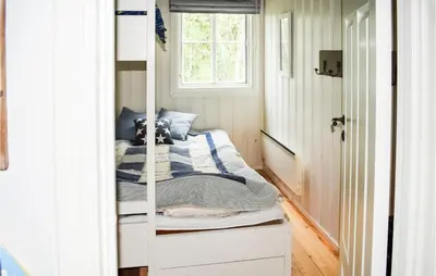 a bedroom with a bunk bed with a window at 3 Bedroom Nice Home In Gol in Gol