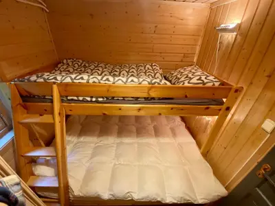 two bunk beds in a sauna in a cabin at Three bedroom holiday house with jacuzzi in Bjorli , pets allowed in Bjorli