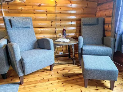 two chairs and a table in a room at Chalet Krampehaugen by Interhome in Utvik