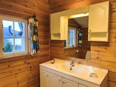 a bathroom with a sink and a mirror at Chalet Krampehaugen by Interhome in Utvik