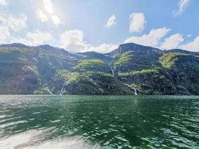 a view of a body of water with mountains at Holiday Home Ørviksnes by Interhome in Steinstø