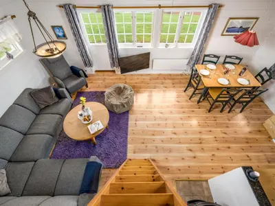 an overhead view of a living room with a couch and a table at Chalet Hagehytta by Interhome in Utvik