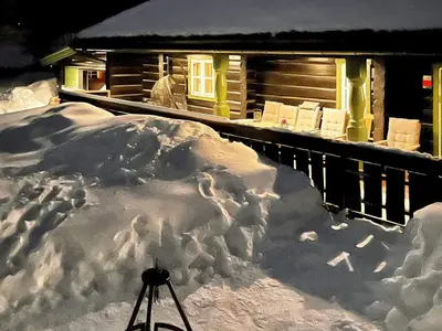 a pile of snow in front of a cabin at 5 star holiday home in Hemsedal-By Traum in Hemsedal