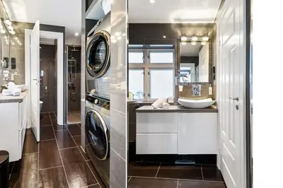 a bathroom with a washing machine and a sink at Dinbnb Homes I Historical 1850 House in Bergen