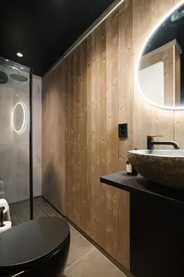 a bathroom with a sink and a toilet and a tub at Hide Hut - Amazing view 50 min from Oslo in Stange