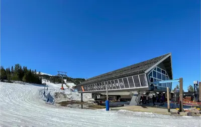 a building on a ski slope in the snow at Lovely Apartment In Trysil With Wifi in Trysil