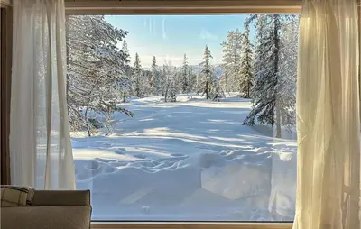 a window with a view of a snow covered yard at 3 Bedroom Amazing Home In Tuddal in Tuddal