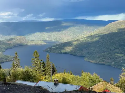 a view of a lake in the mountains at Ny leilighet på Norefjell - ski in/out in Noresund