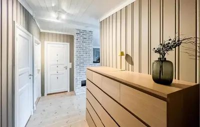 a room with a counter with a vase on it at Beautiful Home In Sjusjøen With Kitchen in Sjusjøen