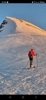 a person is skiing down a snow covered slope at Apartment, Rekkedal Gjestegard - Sæbø in Ørsta