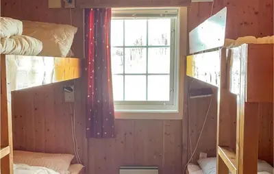a dorm room with a window and bunk beds at 3 Bedroom Lovely Home In Hemsedal in Hemsedal