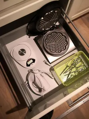 a stove top with some items on top of it at Feriebolig i Garmo in Lom
