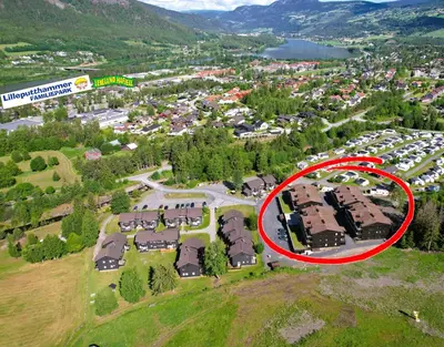 an aerial view of a parking lot with a red circle at Hafjelltunet in Hafjell