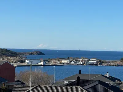 a view of a town with a body of water at Eksluzywny apartament w zaciszu in Kristiansund