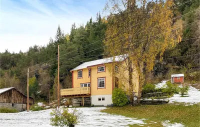 a house in the middle of a snow covered yard at Stunning Home In Verma With Kitchen in Bjorli