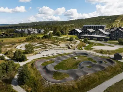 an aerial view of a skate park in front of a building at Mailatunet - Vestlia resort in Geilo