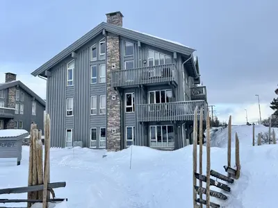 a large house in the snow with snow at Mailatunet - Vestlia resort in Geilo