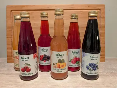 a group of four bottles of different types of juice at Forbord Dome in Tilleraune