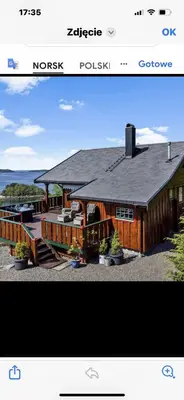 a picture of a house with a roof at Domek Iwony in Molde