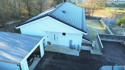 an overhead view of a small white building with a porch at Your Dream Studio in Bergen in Bergen