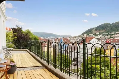 a balcony with a view of a city at Flott leilighet på Nygårdshøyden in Bergen