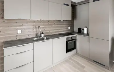 a kitchen with white cabinets and a sink at Awesome Apartment In Geilo With Sauna in Geilo