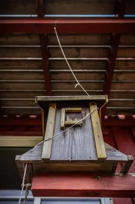 a wooden bird house sitting on top of a table at Osloveien 6 in Røros