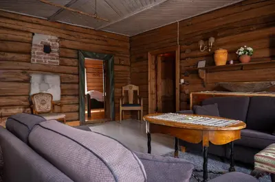 a living room with a couch and a table at Bergmannsgata 3 in Røros