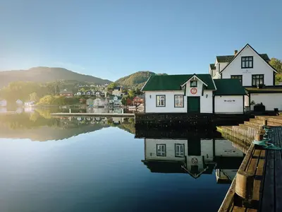 a small town on the water with houses and buildings at Chalet Heggland Huset by Interhome in Heggland