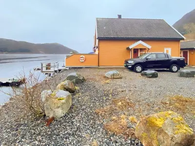 a car parked in front of a house at 6 person holiday home in Gursken-By Traum in Larsnes