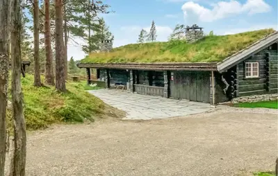 an old log cabin with a grass roof at Stunning Home In Kvam With Wifi in Kvam