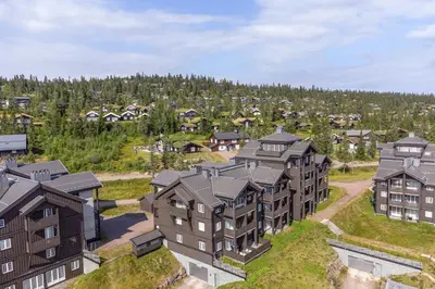 an aerial view of a residential neighborhood with houses at Høyfjellsgrend 962 in Trysil